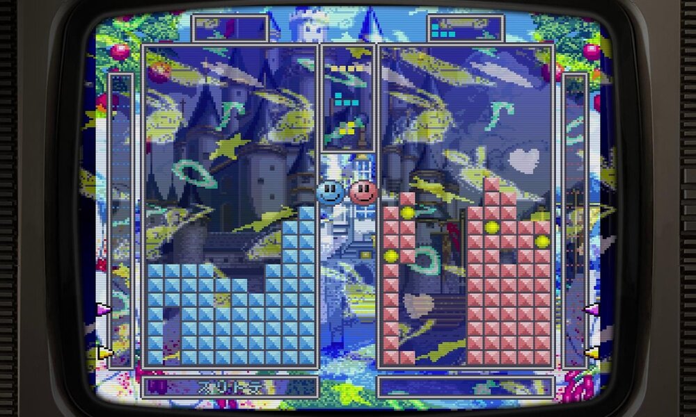 Ein Retro-Videospiel auf einem Röhrenfernseher zeigt zwei Spielfelder mit blauen und roten Blöcken vor einer bunten, verspielten Schlosskulisse. | © Digital Eclipse