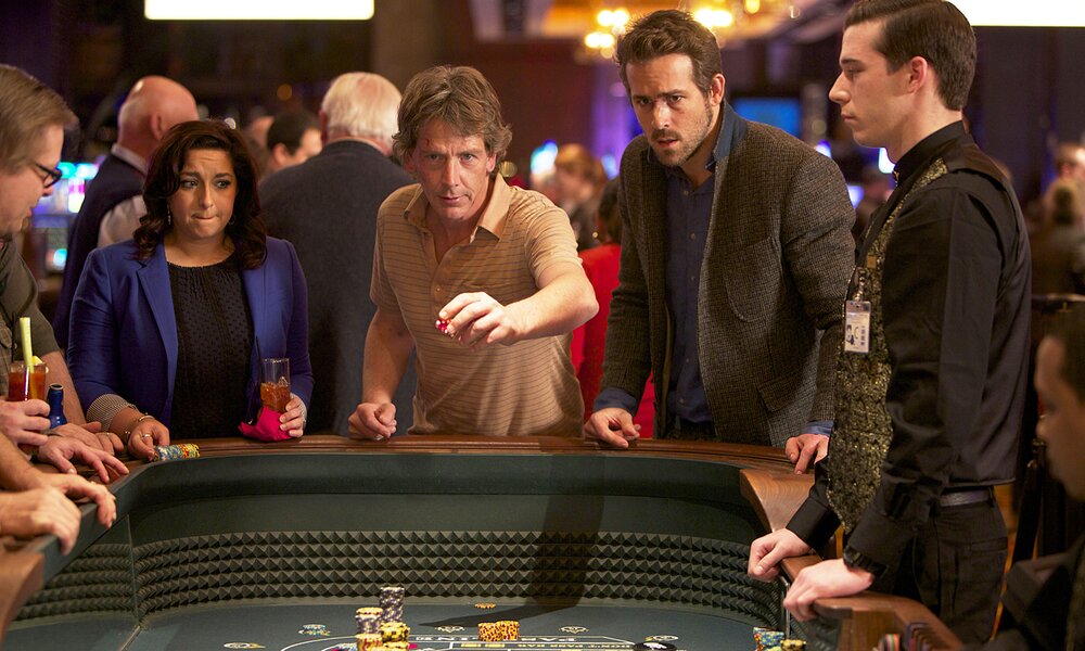 Ben Mendelsohn und Ryan Reynolds in "Dirty Trip" | © ddp images/Everett Collection