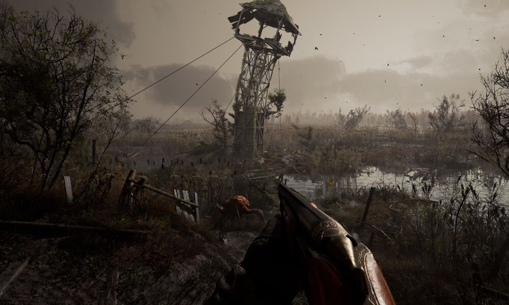 Eine braun-trostlose Landschaft mit einem fast eingestürzten Aussichtsturm in der Mitte. | © GSC Game World