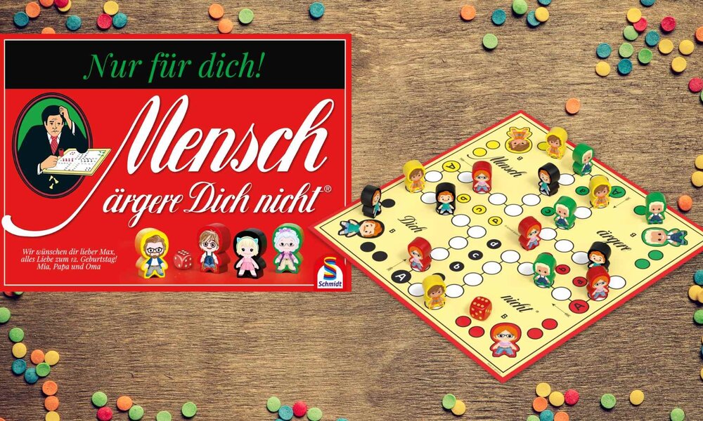 Packung des Spiel und Spielbrett | © Schmidt Spiele / MäDn® Personalisierte Edition