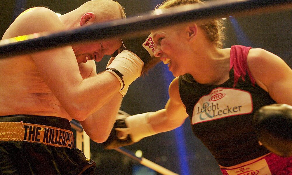 Regina Halmich und Stefan Raab  bei der "Fight Night" 2007. | © Imago